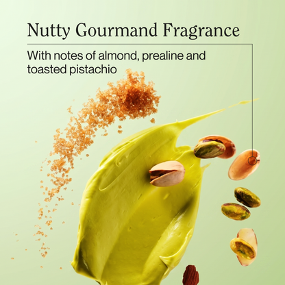Green pistachio cream-like smear with scattered nuts and seed pieces