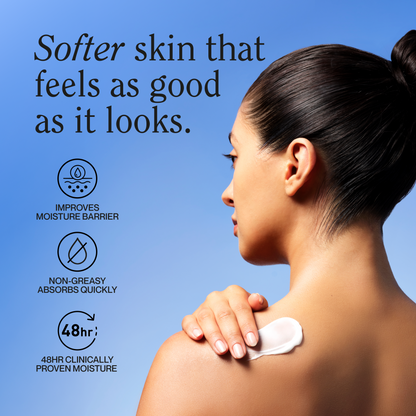 White lotion cream smoothed on shoulder and neck area, held by fingertips